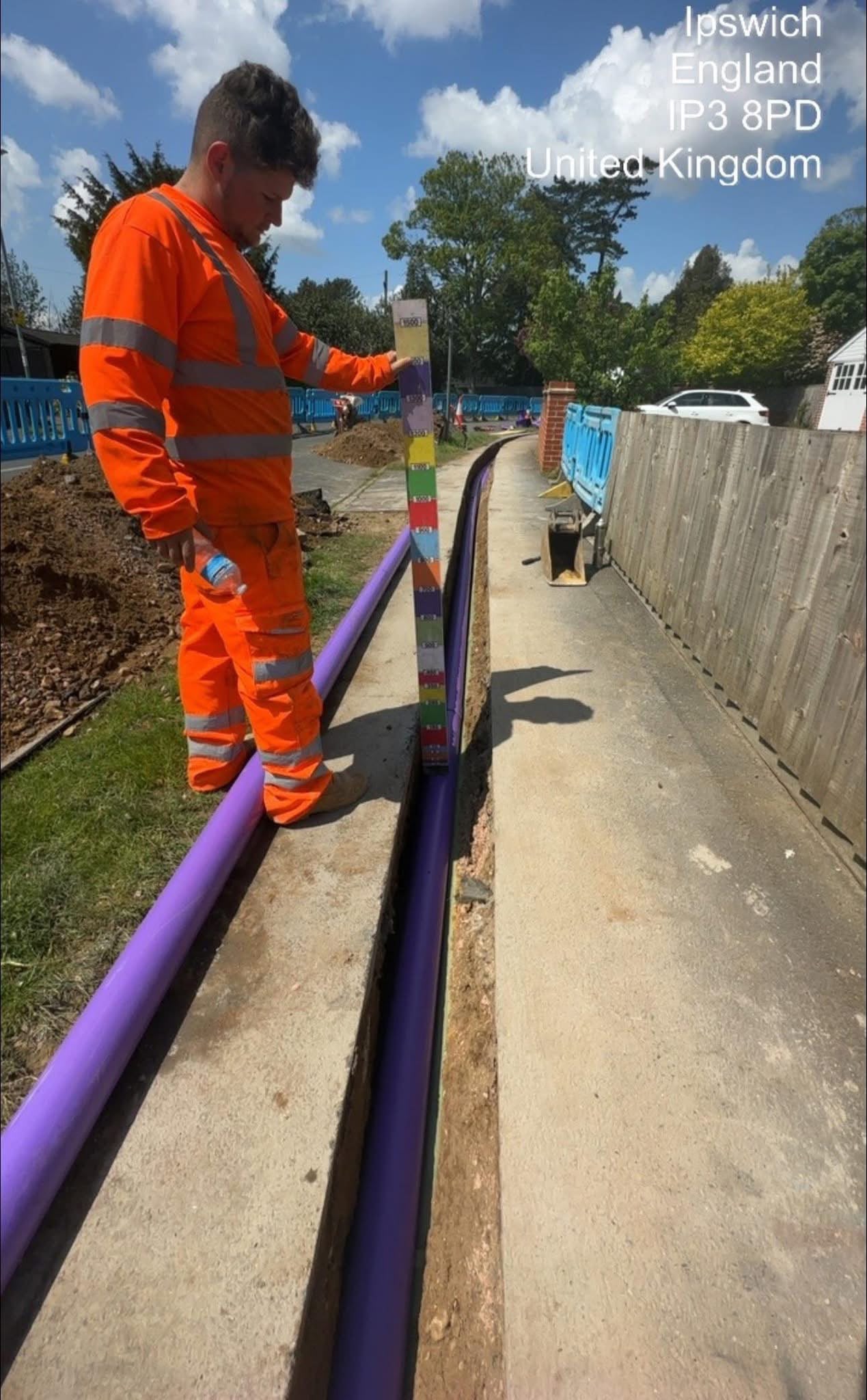 Excavation team installing ducting in Ipswich